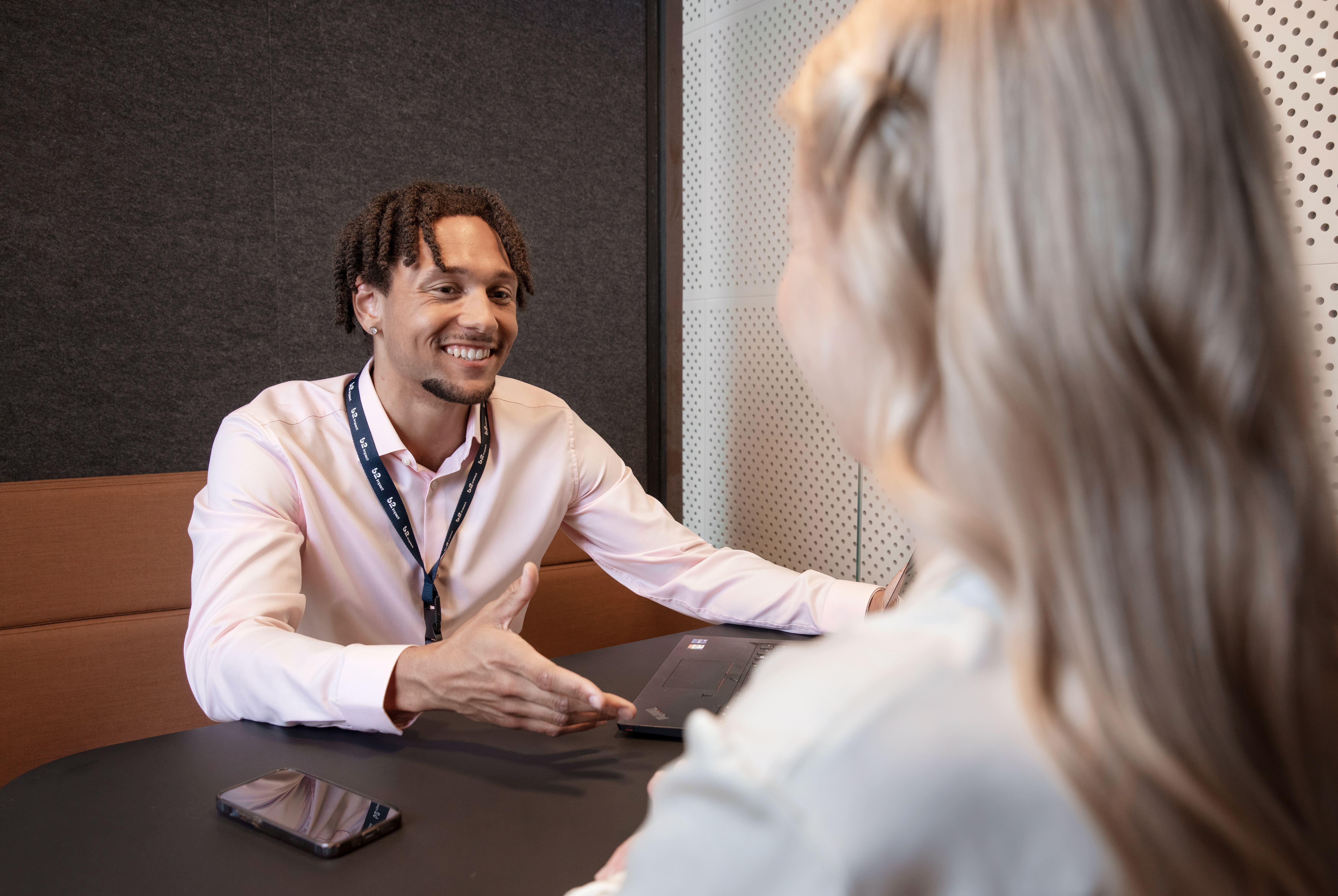 Woman talking on the phone in an office